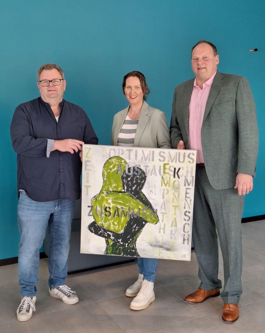 Bildübergabe an das Quartierszentrum Hückelhoven